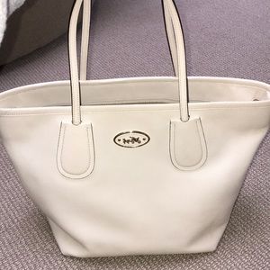 White leather coach tote bag.